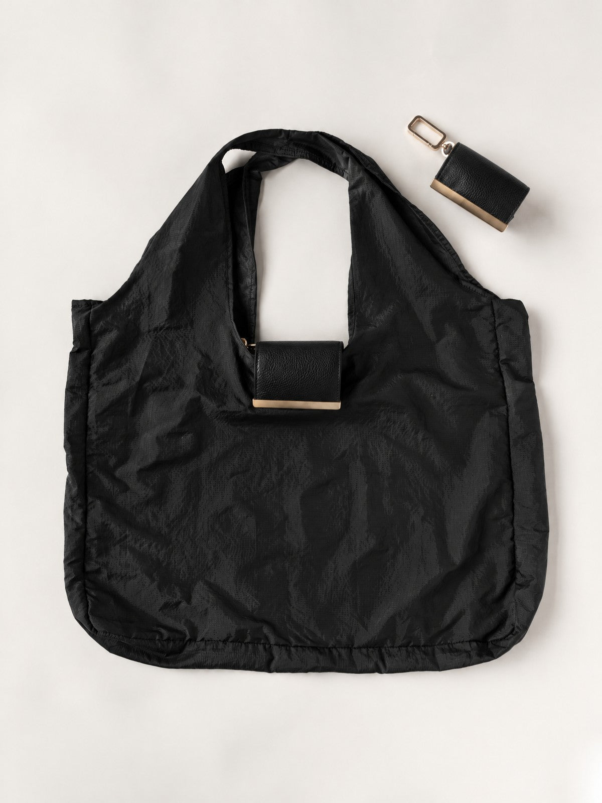 Pochelle keychain tote in Jet